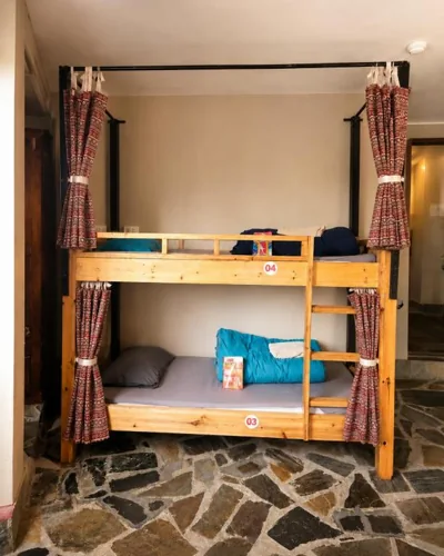 Single Bed in Mixed Dormitory Room — Mega View Homestay